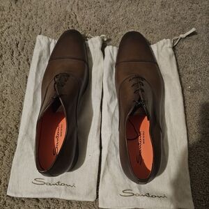 Santoni  dress shoes.  With cloth storage bag.   Size 12 brown color brand new.